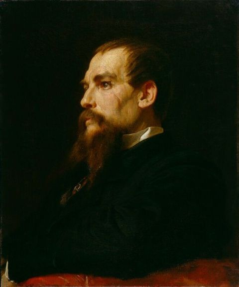 Painting. Shown from the chest up, a pale-skinned man sits facing our left almost in profile. His brown hair is combed forwards, and he has a long, forked beard. The black background sets off the ridge of his eyebrow, his bumped nose, and the network of wrinkles and a scar down his cheek.