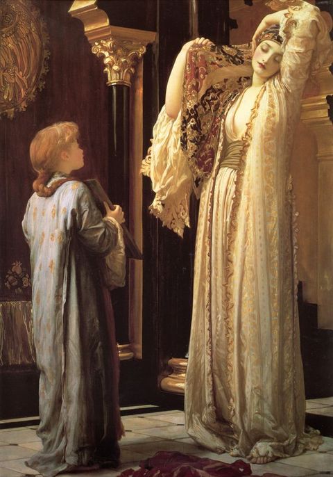 Painting. A pale-skinned girl holds up a mirror for a woman with gold-tinged, white-coloured skin to use. The woman holds up a pattern cloth wrapped around her hair in one hand and drapes her other arm across the top of her head. Her white robes are edged and stitched with gold, and they puddle over bare feet.
