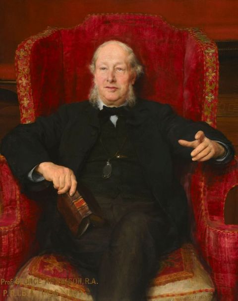 Painting. Shown from the shins up, a pale-skinned balding man with white hair and mutton chops sits in a ruby-red upholstered armchair. There are bags under his eyes, and he has a double chin under sagging jowls. He wears a black suit and sits with his legs crossed, one hand raised as if about to speak.